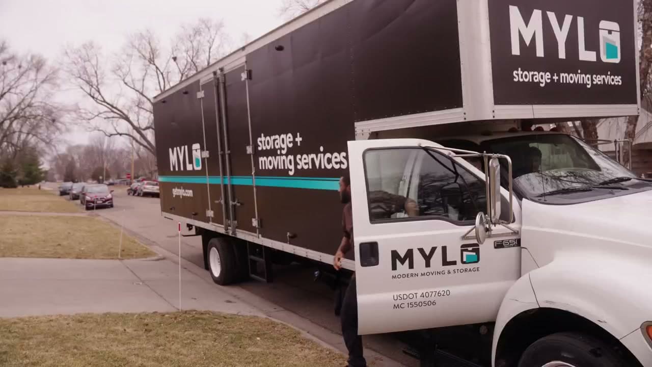 A MYLO Pro crew loading a moving truck